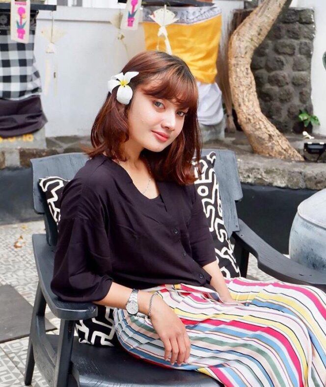 
					Rizky Amelia