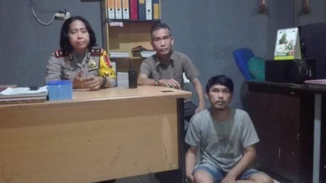 
Pelaku saat diamanmankan, Foto : AJI YK P