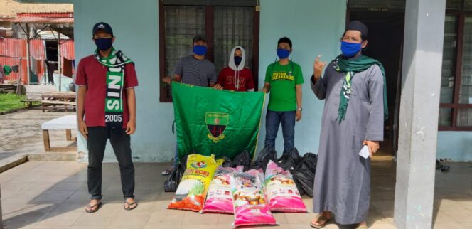 
					Singa Mania Sebar Ratusan Paket Sembako
