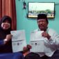 Pasangan suami istri, Refi (kanan) Erlina (kiri) calon jemaah haji asal Palembang yang Gagal Berangkat ke Tanah Suci (Dok. Urban Id)