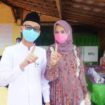 Cabup Oku Timur Yudha bersama istri usai mencoblos di TPS (Dok. Urban Id) 