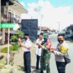 Terlihat Camat Muara Pinang, Sapardinajoly saat meresmikan nama sosok tokoh Prof.Abd Ghanie Sindang.MA. sebagai nama jalan lintas desa Muara Timbuk, Kecamatan Muara Pinang, Kabupaten Empat Lawan. Foto Istimewa
