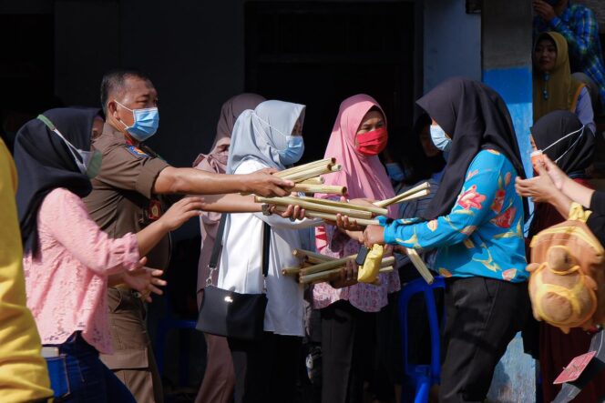 
					Jaga Tradisi, Sedekah Bumi ala Warga Muba Doakan Corona Segera Tiada