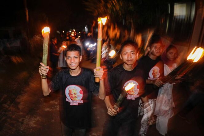 
					Pendukung Ganjar Milenial Adakan Pawai Obor, Sambut Malam Nuzulul Quran