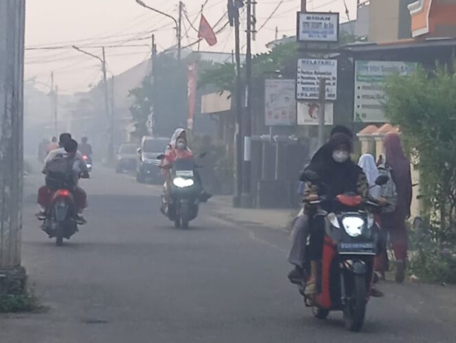 
Jam Belajar Siswa di Palembang Diubah Akibat Kabut Asap