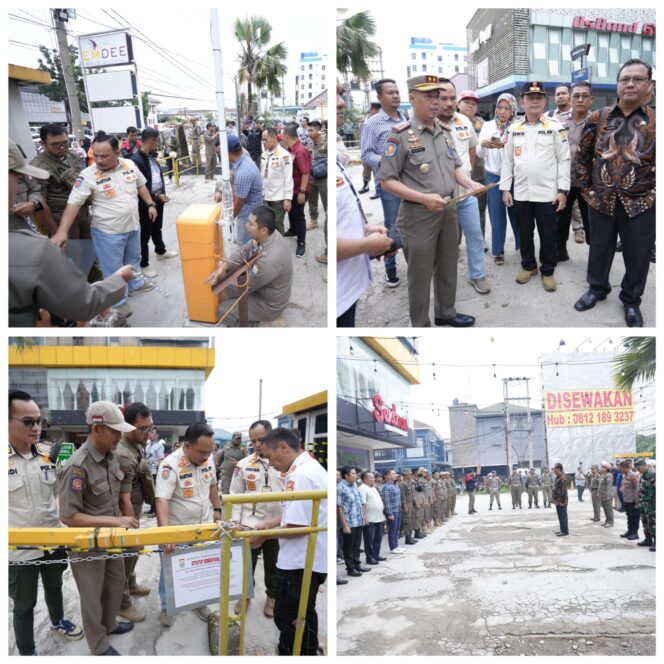 
Nunggak Pajak Rp600 Juta, Pemkot Palembang Segel Parkir Komplek Rajawali