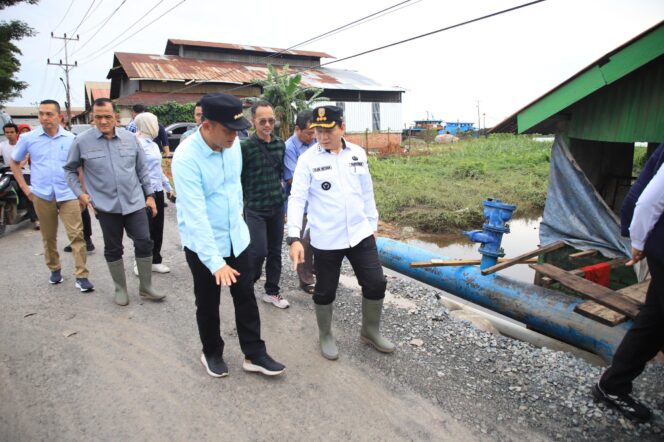 
Pj Gubernur Elen Setiadi Tinjau Kerusakan Ruas Jalan Gandus Palembang