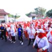 Kegiatan senam jantung sehat dalam rangka HUT ke-44 YJI di kawasan Kambang Iwak, Minggu (9/11/2025).