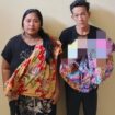 Kedua pelaku yang hendak menjual bayi. Foto : Polda Sumsel