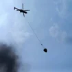 Helikopter water bombing saat padamkan karhutla. Foto: W Pratama/Urban Id