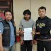 Pelaku saat diamankan di Polres Banyuasin. Foto : Istimewa